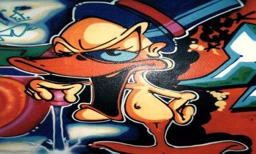 graffiti with a duck with a top hat